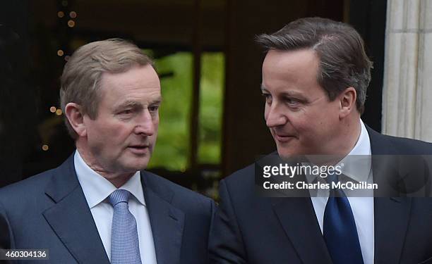 Prime Minister David Cameron and Irish Taoiseach Enda Kenny arrive for cross party talks at Stormont on December 11, 2014 in Belfast, Northern...