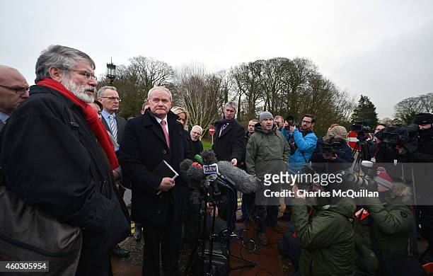 The Sinn Fein delegation including Martin McGuinness and Gerry Adams address the media as they arrive for cross party talks at Stormont on December...