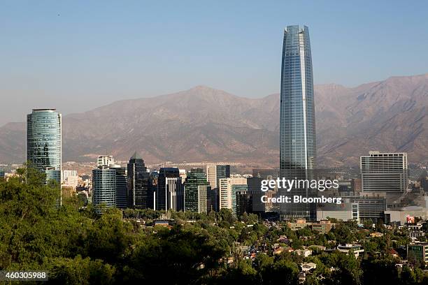 Buildings stand in the skyline of downtown Santiago, Chile, on Wednesday, Dec. 3, 2014. Chilean unemployment unexpectedly fell in the three months...