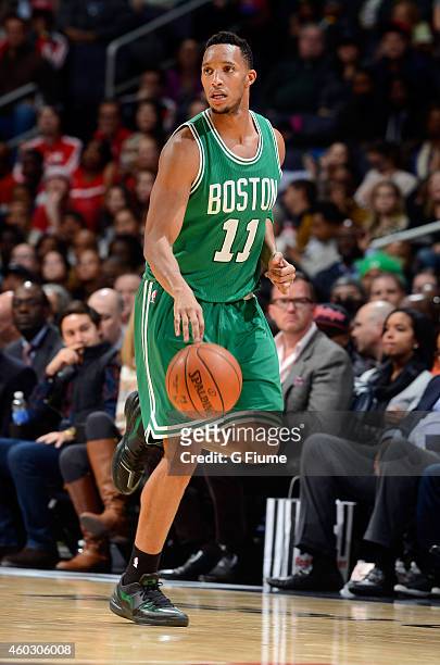 Evan Turner of the Boston Celtics handles the ball against the Washington Wizards at the Verizon Center on December 8, 2014 in Washington, DC.