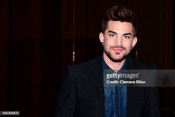 Adam Lambert attends a photocall on the occasion of the musical project 'Queen & Adam Lambert' at Ritz Carlton on December 11, 2014 in Berlin,...