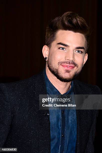 Adam Lambert attends a photocall on the occasion of the musical project 'Queen & Adam Lambert' at Ritz Carlton on December 11, 2014 in Berlin,...