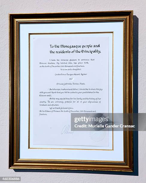 The official announcement of the birth of the royal twins Prince Jacques and Princess Gabriella hangs on the outside wall of the Monaco Palace on...