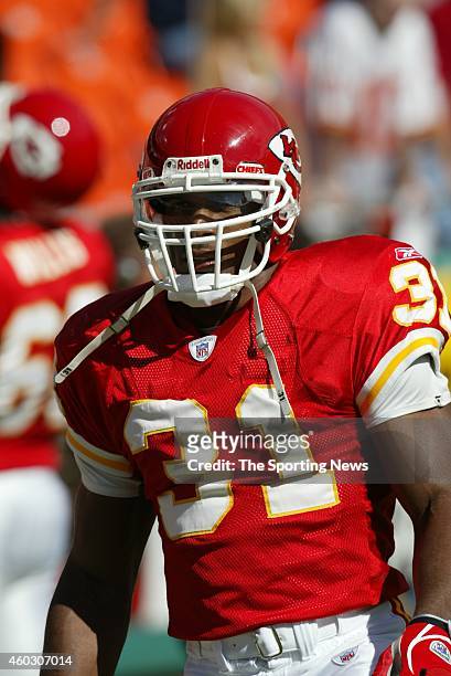 Priest Holmes of the Kansas City Chiefs looks on before a game against the Denver Broncos on October 5, 2003 at Arrowhead Stadium in Kansas City,...