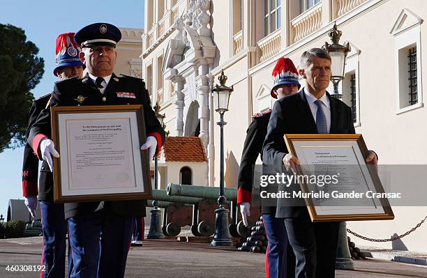 Colonel Luc Frigan and Chamberlain Laurent Soler carry the official announcement of the birth of the royal twins Prince Jacques and Princess...