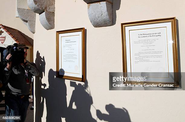 The official announcement of the birth of the royal twins Prince Jacques and Princess Gabriella hangs on the outside wall of the Monaco Palace on...