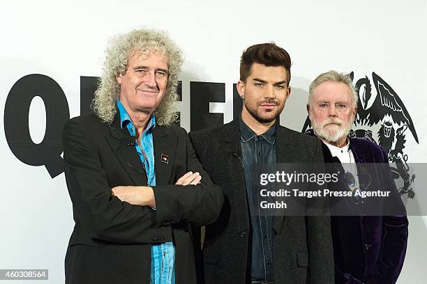 Brian May, Adam Lambert and Roger Taylor attends the Queen and Adam Lambert photocall at Ritz Carlton on December 11, 2014 in Berlin, Germany.