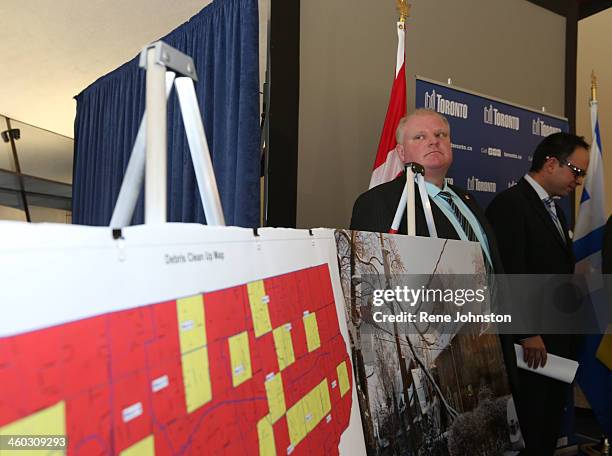 Toronto Mayor Ford with the action plan boards. Mayor Rob Ford Denzil Minnan-Wong and Deputy Mayor Norm Kelly announced the plan to start cleaning up...
