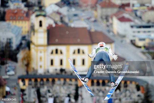 Thomas Diethart of Austria soars through the air during his second training jump on day 1 of the Four Hills Tournament event at Bergisel on January...