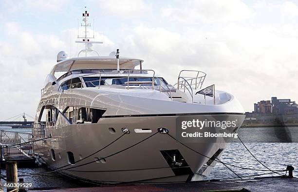 Sunseeker 115 luxury yacht, manufactured by Sunseeker International Ltd., a unit of China's Dalian Wanda Group, sits moored in the Royal Victoria...