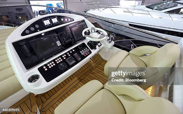 The external navigation control deck of the Sunseeker 75 luxury yacht, manufactured by Sunseeker International Ltd., a unit of China's Dalian Wanda...