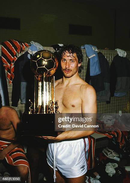 England defender Kenny Sansom pictured in the dressing room with the trophy after a 2-0 win over Brazil at the Maracana on June 10, 1984 in Rio de...