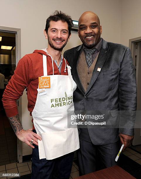 Personality Gabriele Corcos and Director of Food Distribution of Harlem at Food Bank For New York City Daryl Foriest attends Feeding America Hosts...