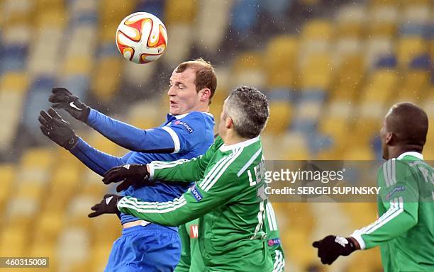 Dnipro's Roman Zozulya and AS Saint-Etienne's Fabien Lemoine vie for the ball during the UEFA Europa League Group F football match FC Dnipro vs AS...