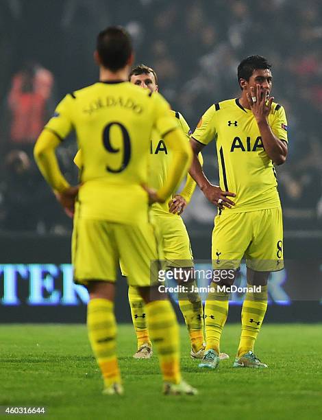 Roberto Soldado, Vlad Chiriches and Paulinho of Spurs look dejected as Cenk Tosun of Besiktas scores their first goal during the UEFA Europa League...