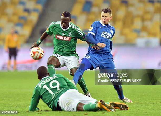 Dnipro's Ruslan Rotan vies with AS Saint-Etienne's Ismael Diomande and Florentin Pogba during the UEFA Europa League Group F football match between...