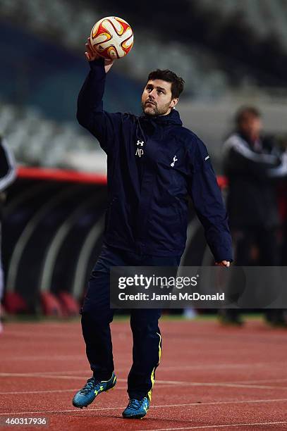 Mauricio Pochettino manager of Spurs catches the match ball during the UEFA Europa League Group C match between Besiktas JK and Tottenham Hotspur FC...