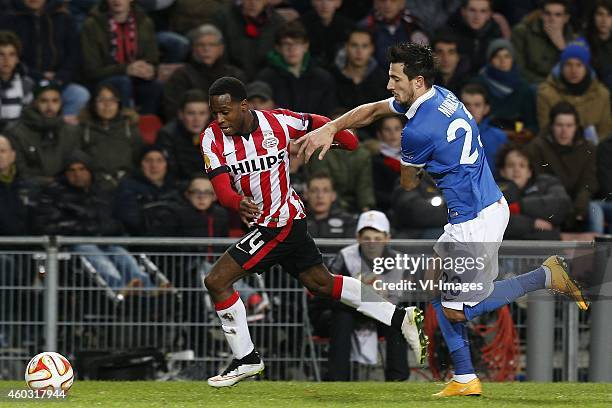 , Florian Jozefzoon of PSV, Stanislav Manolev of Dinamo Moscow during the UEFA Europa League group match between PSV Eindhoven and Dinamo Moscow on...