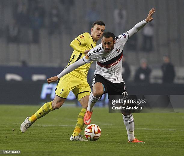 Cenk Tosun of Besiktas in action with Vlad Chirichesi of Tottenham Hotspur during the UEFA Europa League Group C match between Besiktas JK and...