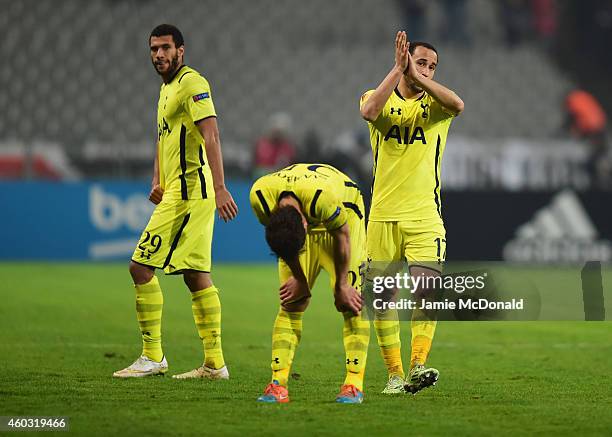 Etienne Capoue, Benjamin Stambouli and Andros Townsend of Spurs look dejected in defeat after the UEFA Europa League Group C match between Besiktas...