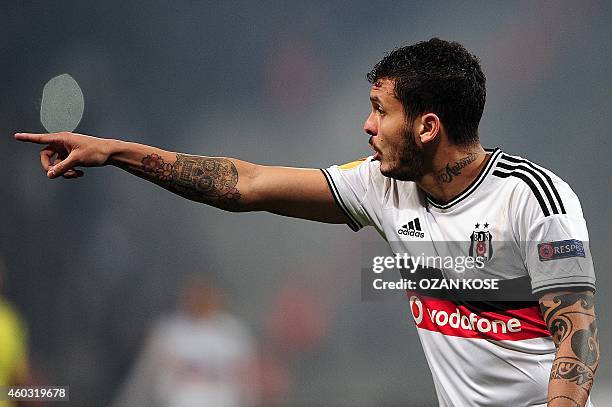 Besiktas' Ramon Motta gestures during the UEFA Europa League Group C football match Besiktas vs Tottenham at Ataturk Olimpic Stadium in Istanbul on...