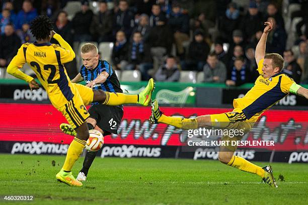 Helsinki's midfielder Anthony Annan and Brugge's Nikola Storm vie for the ball during the UEFA Europa League group B football match between Club...