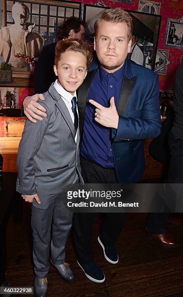 Daniel Huttlestone and James Corden attends a Special Screening of "Into The Woods" at The Soho Hotel on December 11, 2014 in London, England.