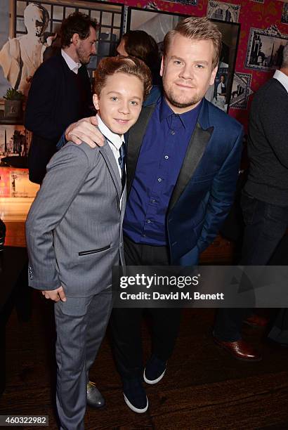 Daniel Huttlestone and James Corden attends a Special Screening of "Into The Woods" at The Soho Hotel on December 11, 2014 in London, England.