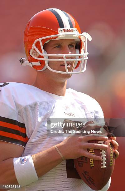 Tim Couch of the Cleveland Browns participates in warm-ups before a game against the Indianapolis Colts on September 08, 2003 at the Cleveland Browns...