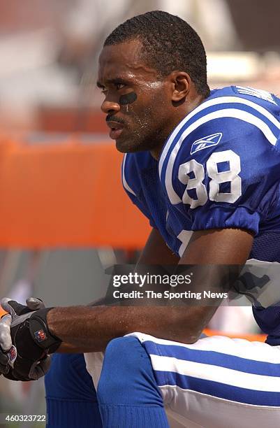 Marvin Harrison of the Indianapolis Colts rests on the bench during a game against the Cleveland Browns on September 08, 2003 at the Cleveland Browns...
