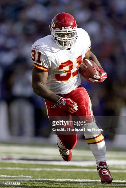 Priest Holmes of the Kansas City Chiefs runs with the ball during a game against the Baltimore Ravens on September 28, 2003 at M&T Bank Stadium in...