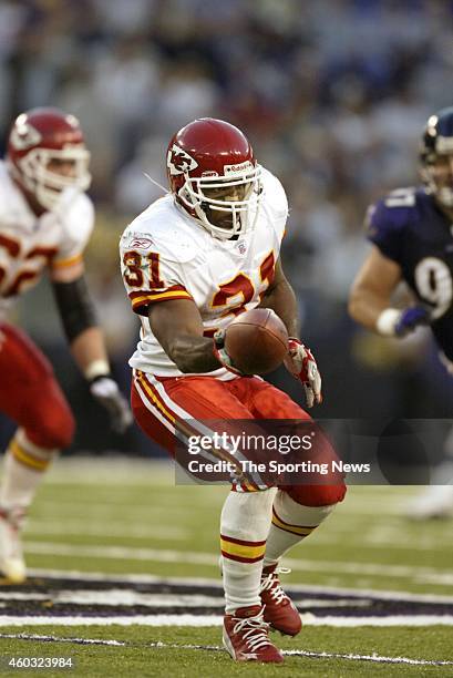 Priest Holmes of the Kansas City Chiefs runs with the ball during a game against the Baltimore Ravens on September 28, 2003 at M&T Bank Stadium in...