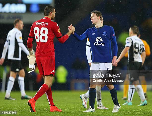 Andrei Sinitsin of Krasnodar shakes hands with Kieran Dowell of Everton after the UEFA Europa League Group H match between Everton and Krasnodar at...