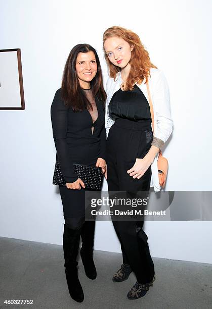 Ali Hewson and Lily Cole attend the Edun Pre Fall Dinner at Alison Jacques Gallery on December 11, 2014 in London, England.