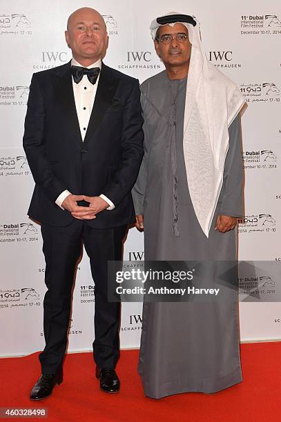 Georges Kern and DIFF Chairman Abdulhamid Juma during the IWC Schaffhausen Filmmaker Award Night 2014 at The One & Only Royal Mirage on December 11,...