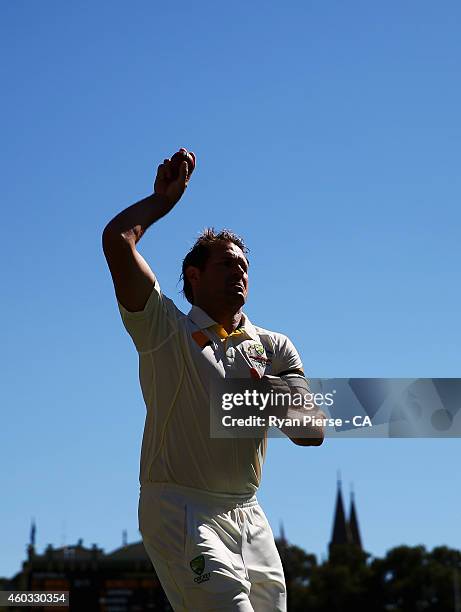 Ryan Harris of Australia warms up during day four of the First Test match between Australia and India at Adelaide Oval on December 12, 2014 in...