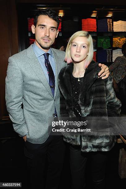Models Arthur Kulkov and Chloe Blackshire attend the Tommy Hilfiger and GQ event honoring The Men Of New York at the Tommy Hilfiger Fifth Avenue...