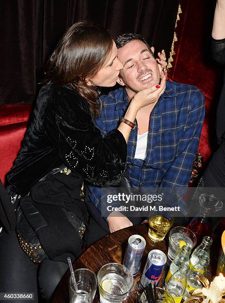 Rosemary Ferguson and Dave Gardner attend the Glam Rock Christmas party to celebrate the collaboration between House of Hackney and Terry De...