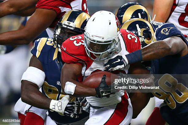 Kerwynn Williams of the Arizona Cardinals runs the ball in the third quarter against the St. Louis Rams during their game at Edward Jones Dome on...