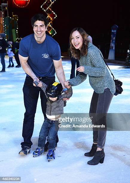 Actor Brandon Routh , actress Courtney Ford and their son Leo James Routh attend the Disney On Ice Presents Let's Celebrate! event at Staples Center...