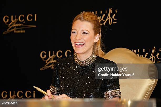 Blake Lively attends a photocall and meets 'Gucci Premiere' competition winners at Galeries Lafayette, Dubai Mall on January 3, 2014 in Dubai, United...