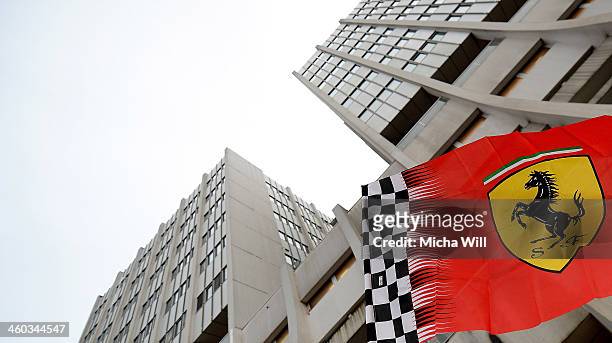 Ferrari flag flies outside the Grenoble University Hospital Centre where former German Formula One driver Michael Schumacher is being treated for a...
