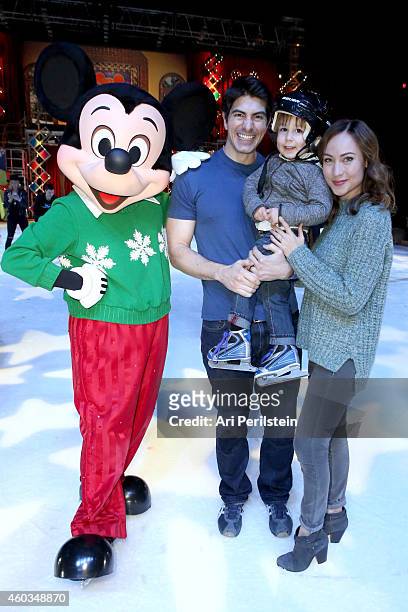 Actor Brandon Routh, son Leo James Routh, and Actress Courtney Ford attend Disney On Ice Presents Let's Celebrate! Presented By Stonyfield YoKids...