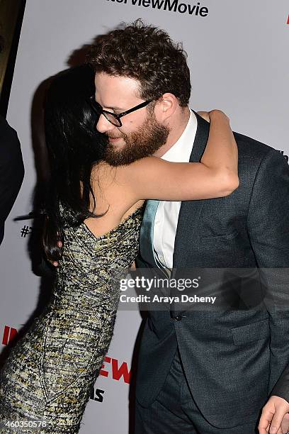 Diana Bang and Seth Rogen arrive at the Los Angeles premiere of 'The Interview' held at The Theatre at Ace Hotel Downtown LA on December 11, 2014 in...
