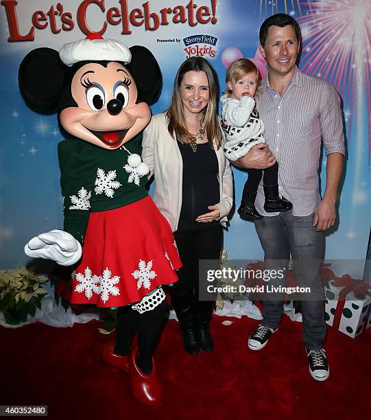 Actress Beverley Mitchell, husband Michael Cameron and daughter Kenzie Lynne Cameron attend Disney On Ice presents Let's Celebrate! at Staples Center...