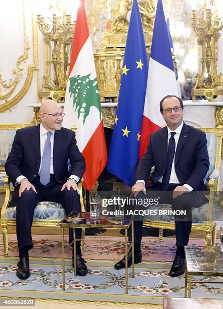 French President Francois Hollande meets Lebanese Prime Minister Tammam Salam at the Elysee Palace in Paris, on December 12, 2014. AFP PHOTO / POOL /...