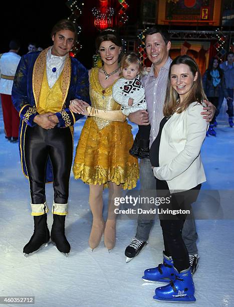 Actress Beverley Mitchell , husband Michael Cameron and daughter Kenzie Lynne Cameron attend Disney On Ice presents Let's Celebrate! at Staples...