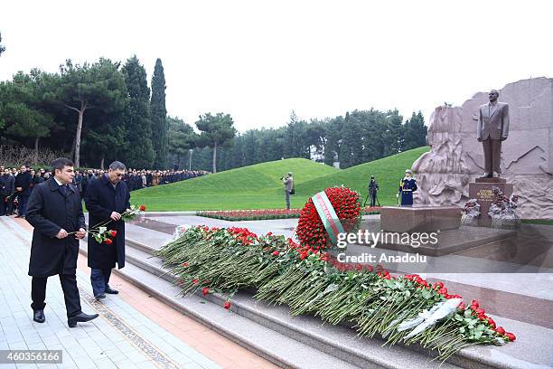 Azerbaijanis lay flowers to the monument of the Azerbaijani National Leader Heydar Aliyev commemorating the 11rd anniversary of his death in Baku,...