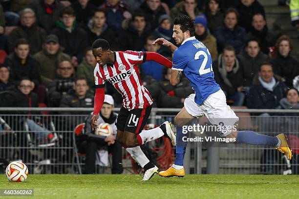 , Florian Jozefzoon of PSV, Stanislav Manolev of Dinamo Moscow during the UEFA Europa League group match between PSV Eindhoven and Dinamo Moscow on...