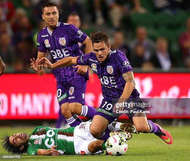 Zenon Caravella of the Jets and Josh Risdon of the Glory contest for the ball during the round 11 A-League match between Perth Glory and Newcastle...